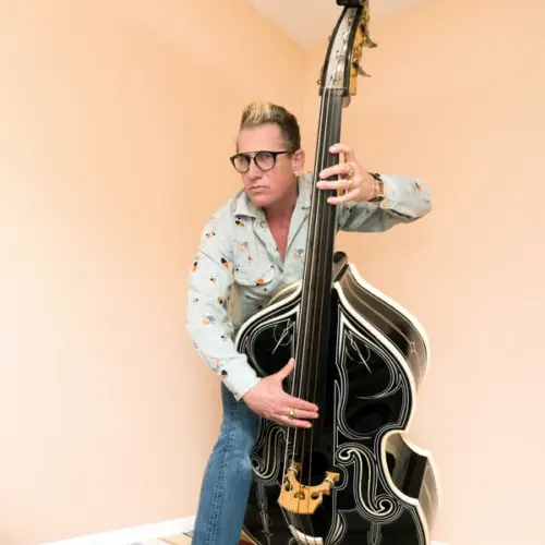 Lee Rocker of the Stray Cats destroying his living room.